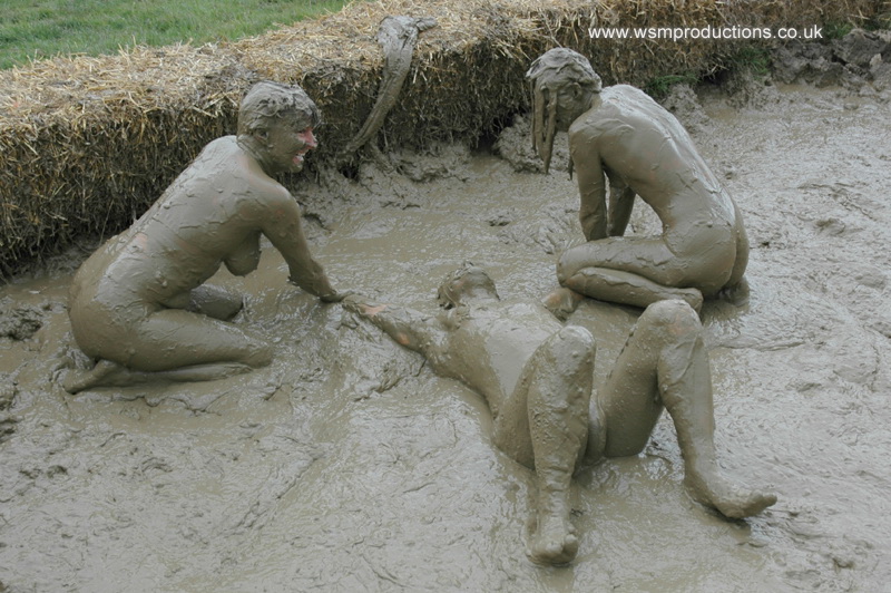 Naked girls mud bondage
